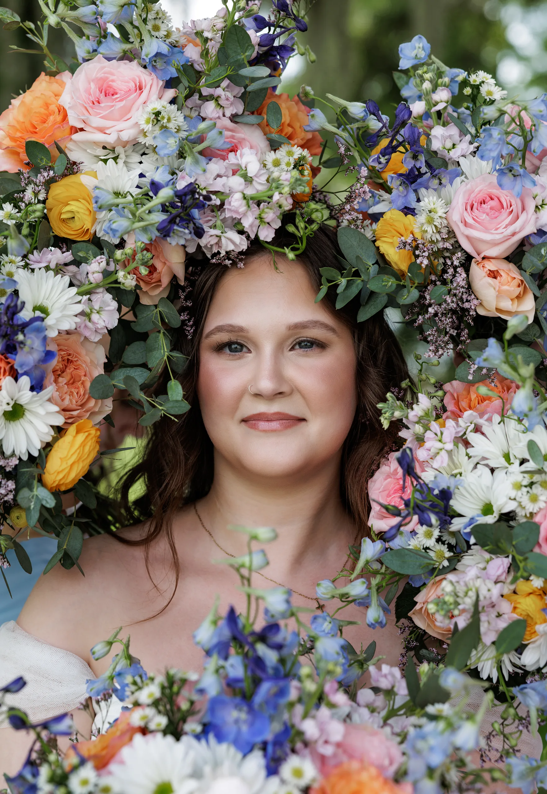 Bride wearing a floral crown before her wedding at Lake Mary Events Center